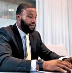 Executive working at a laptop